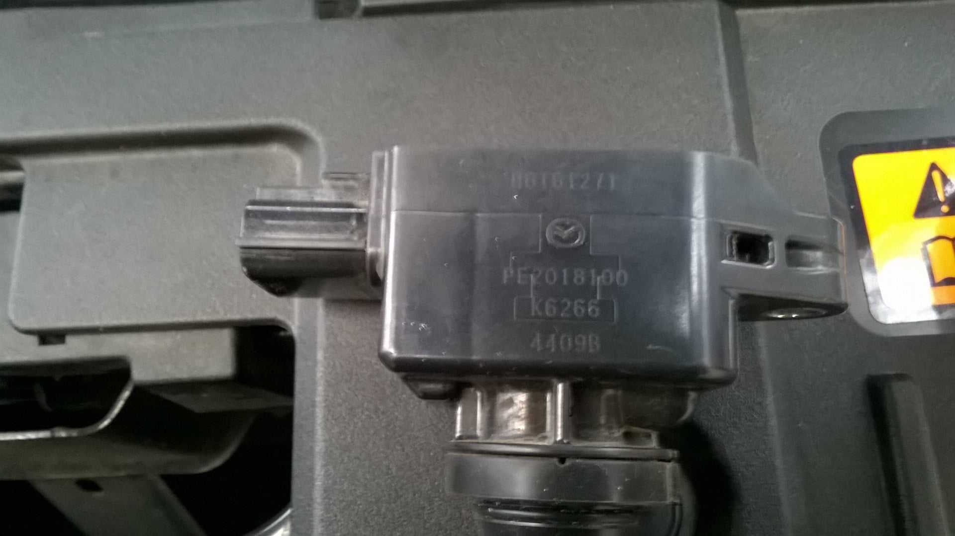 Мазда сх 5 свечи зажигания когда менять